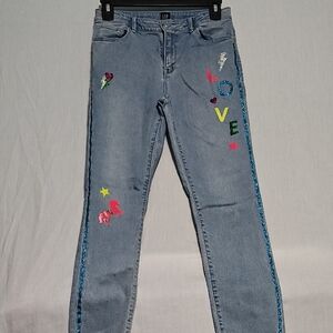 Gap High Stretch Super Skinny Jeans in a light wash with glitter "LOVE" graphic